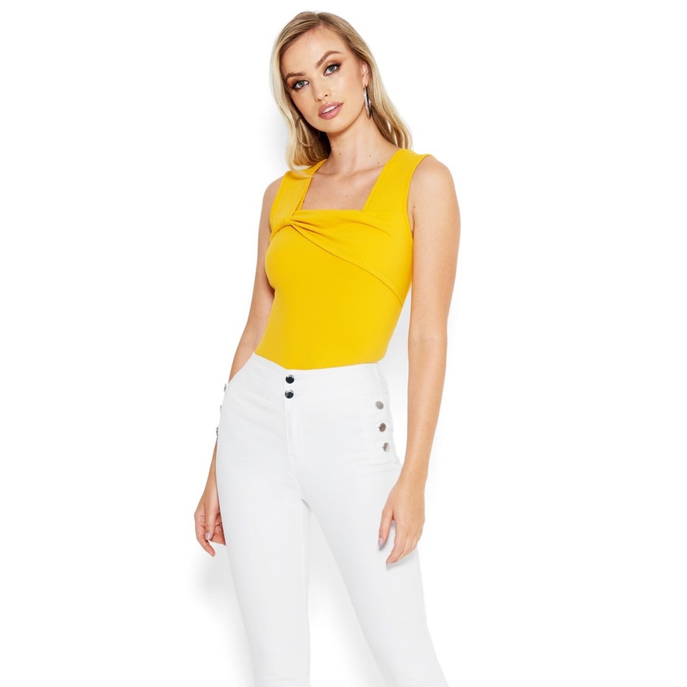 BEBE BUTTON DETAIL SKINNY DENIM